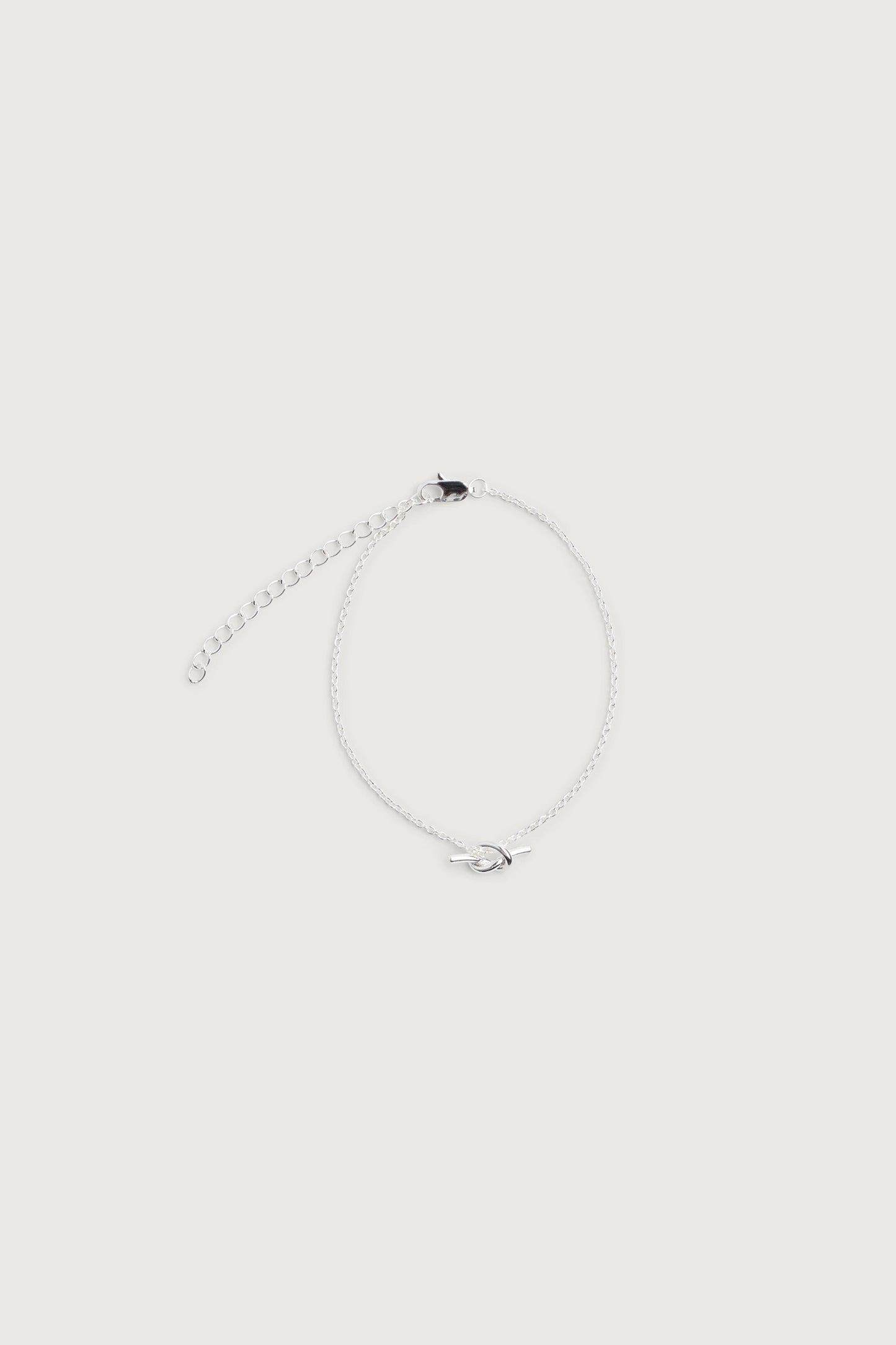 CHAIN BRACELET WITH KNOT CHARM