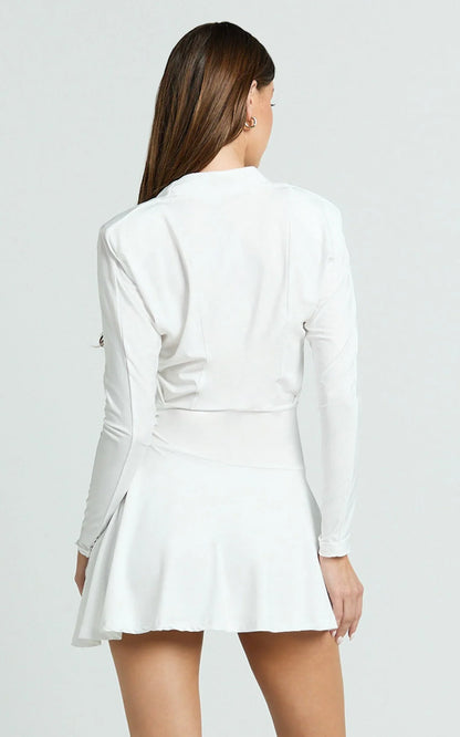 Cannes Mini Dress - Jersey Wrap Hardware Detail Flounce Skirt Dress in Off White