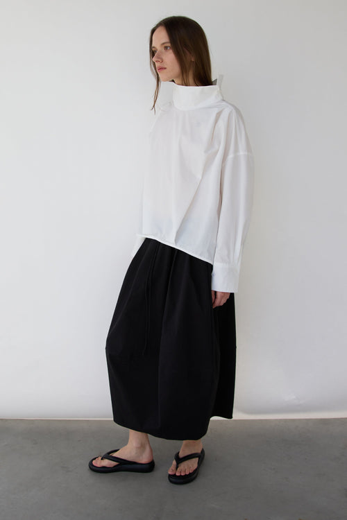 OVERSIZED PLEATED MOCKNECK BLOUSE