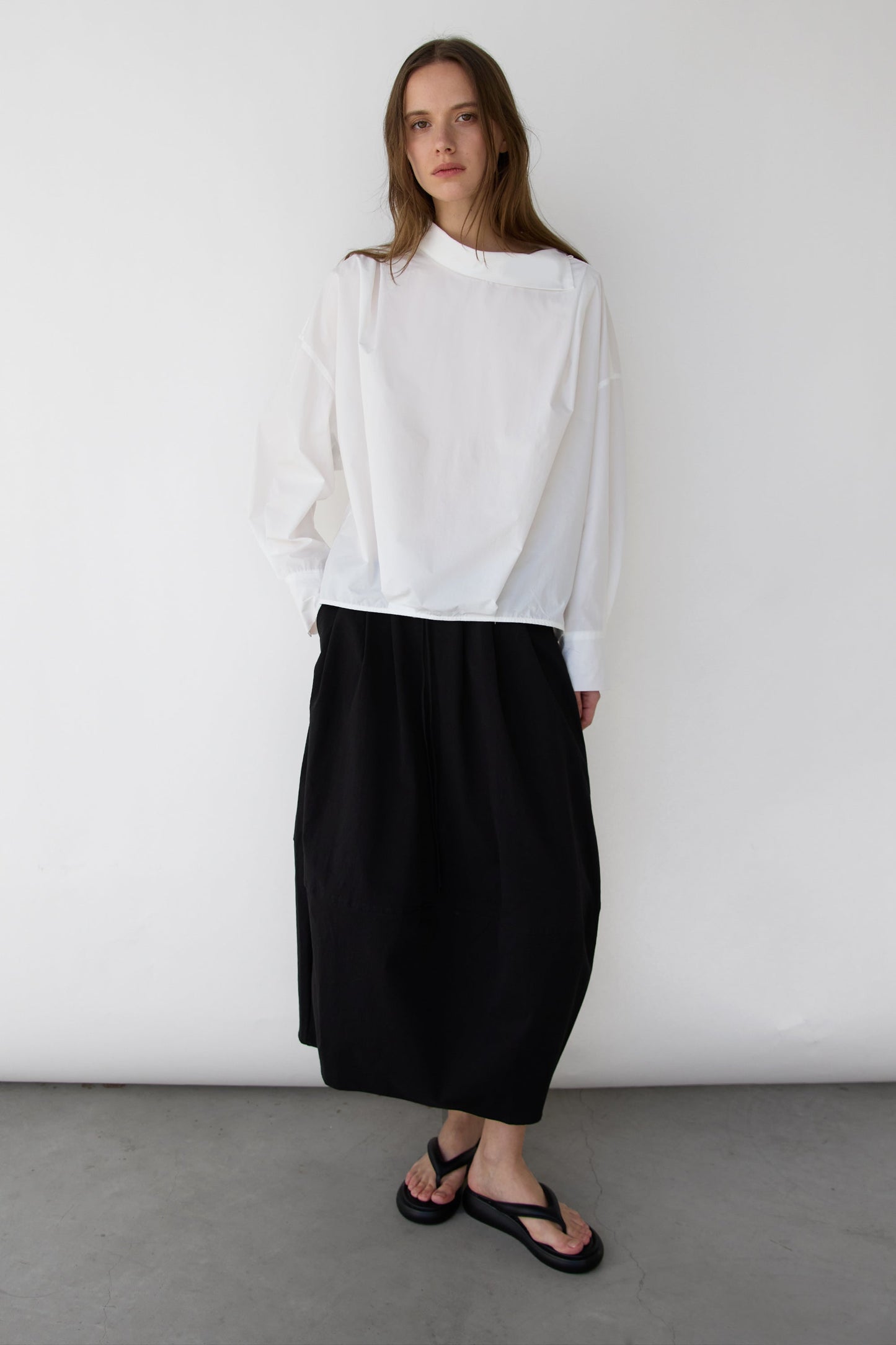 OVERSIZED PLEATED MOCKNECK BLOUSE