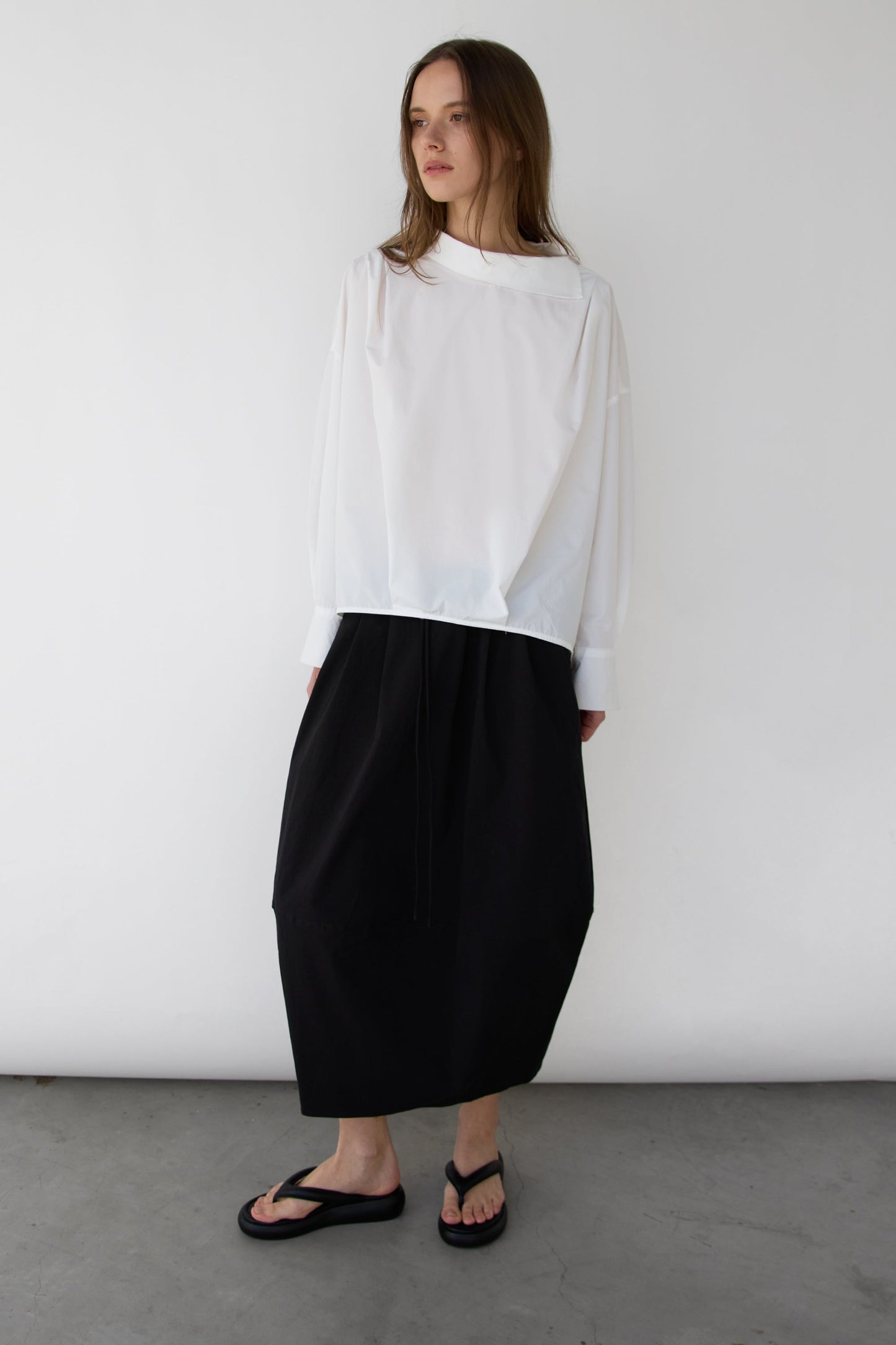 OVERSIZED PLEATED MOCKNECK BLOUSE