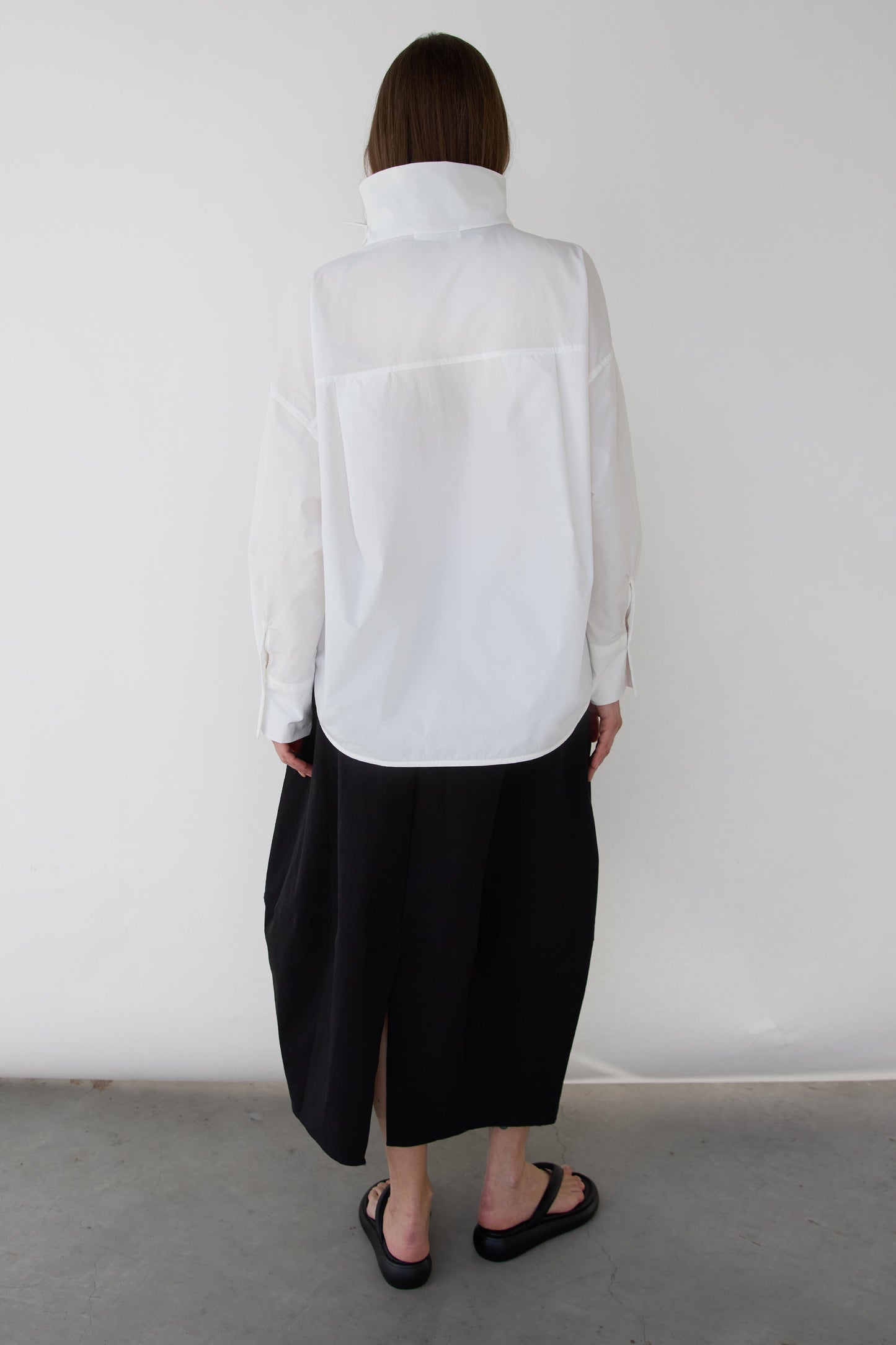 OVERSIZED PLEATED MOCKNECK BLOUSE