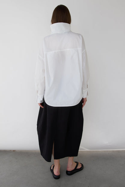 OVERSIZED PLEATED MOCKNECK BLOUSE