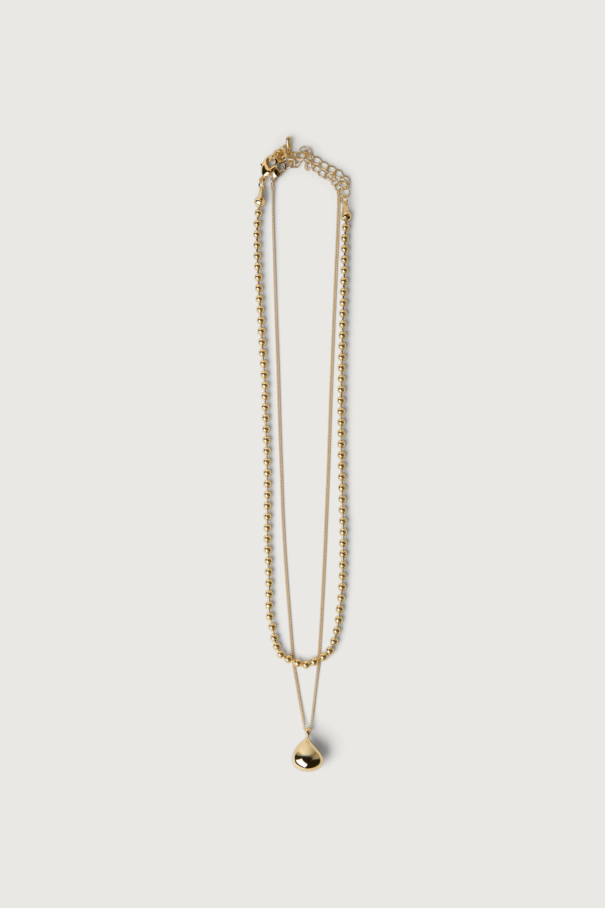 LAYERED HEART PENDANT NECKLACE