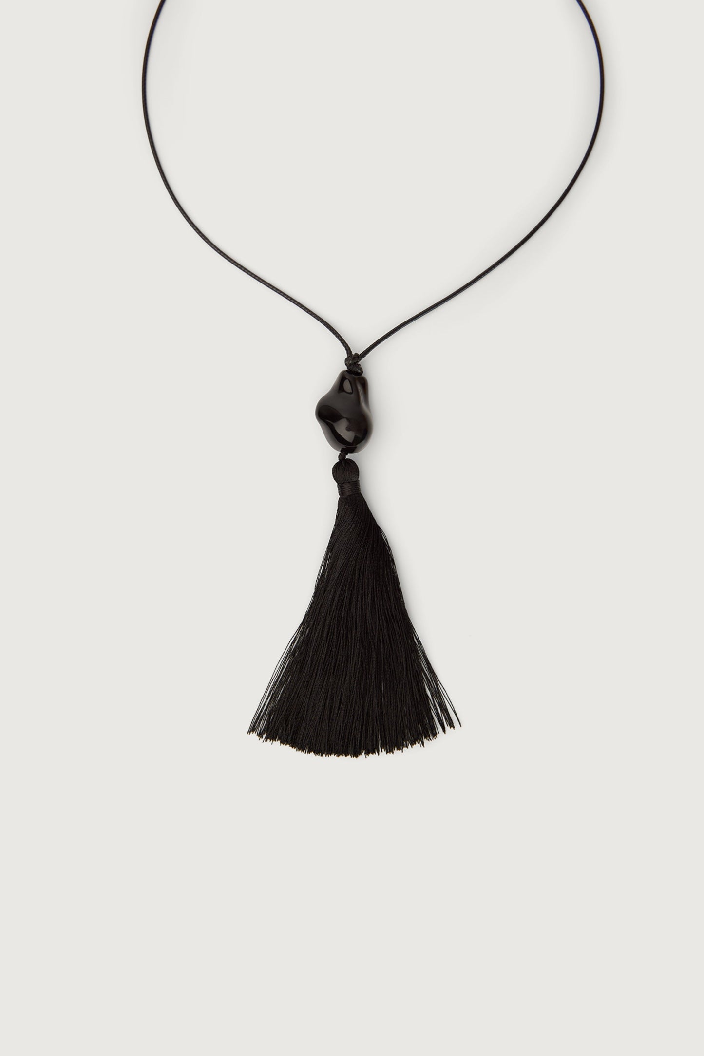 BLACK STONE TASSEL CORD NECKLACE