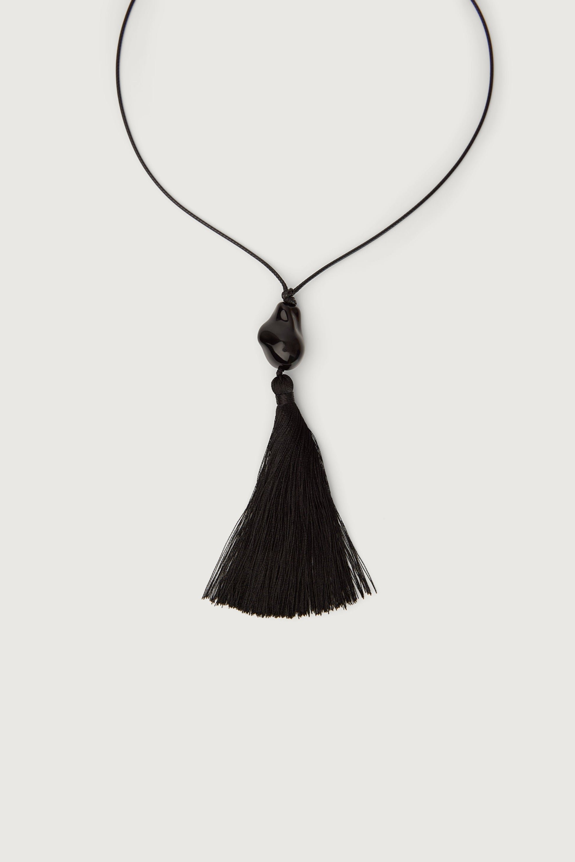 BLACK STONE TASSEL CORD NECKLACE