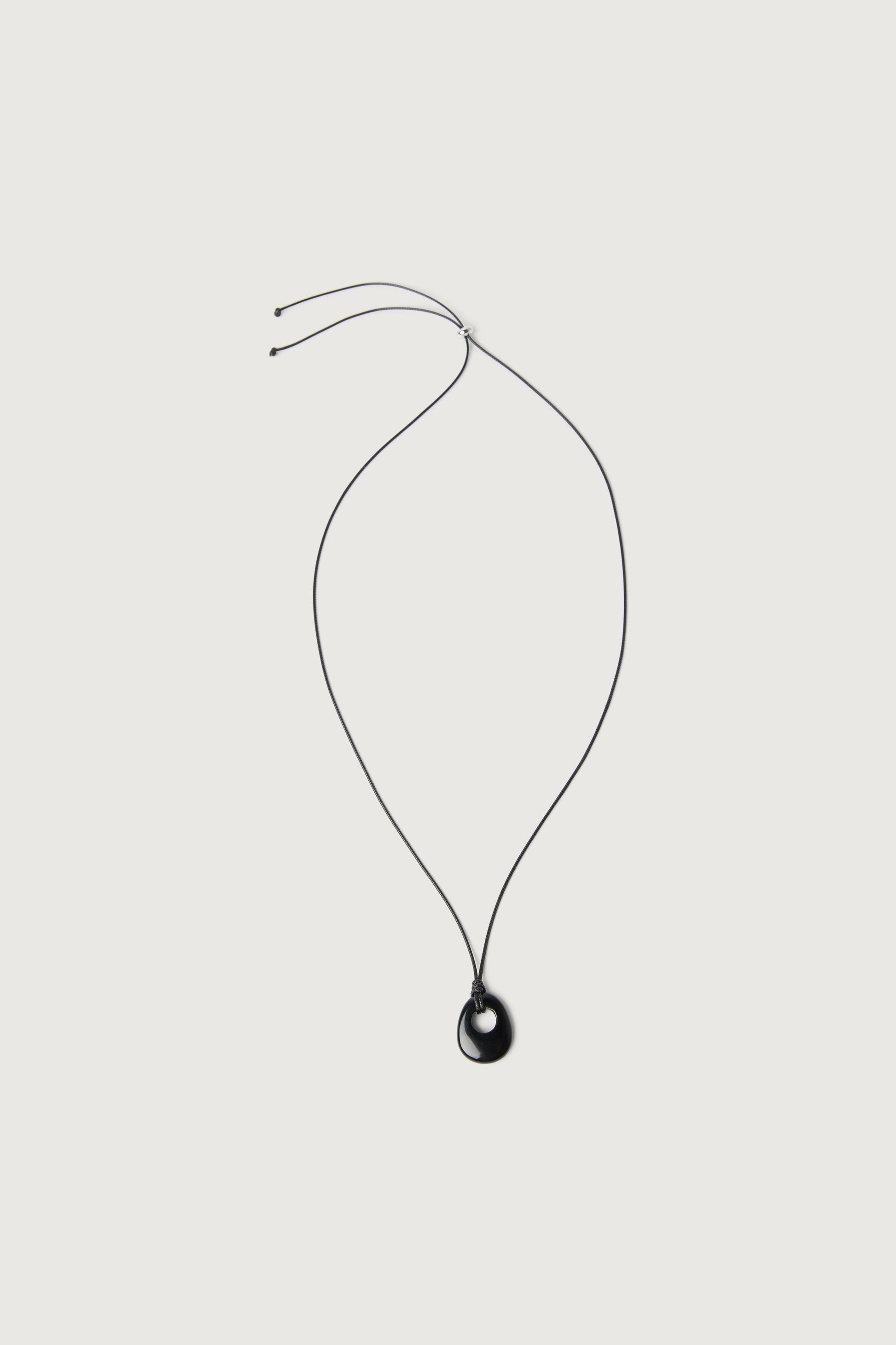 HOLLOW STONE PENDANT NECKLACE