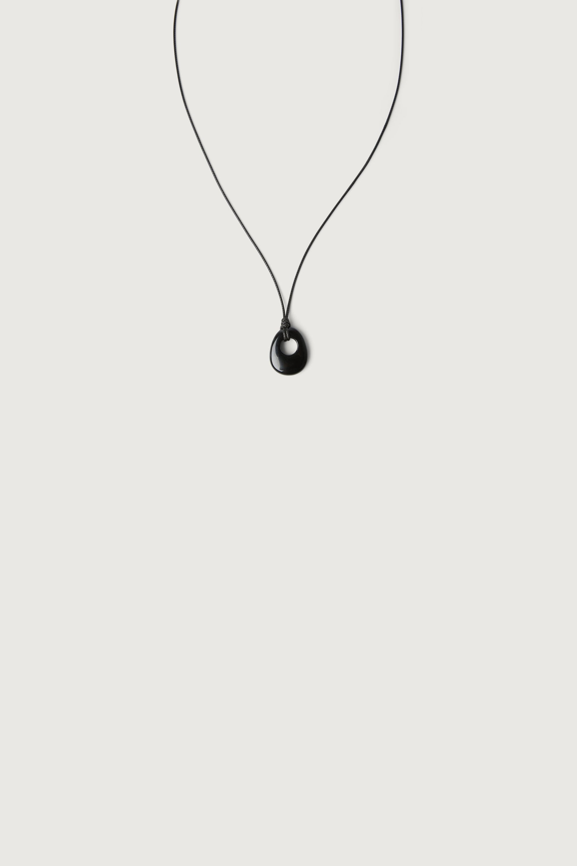 HOLLOW STONE PENDANT NECKLACE
