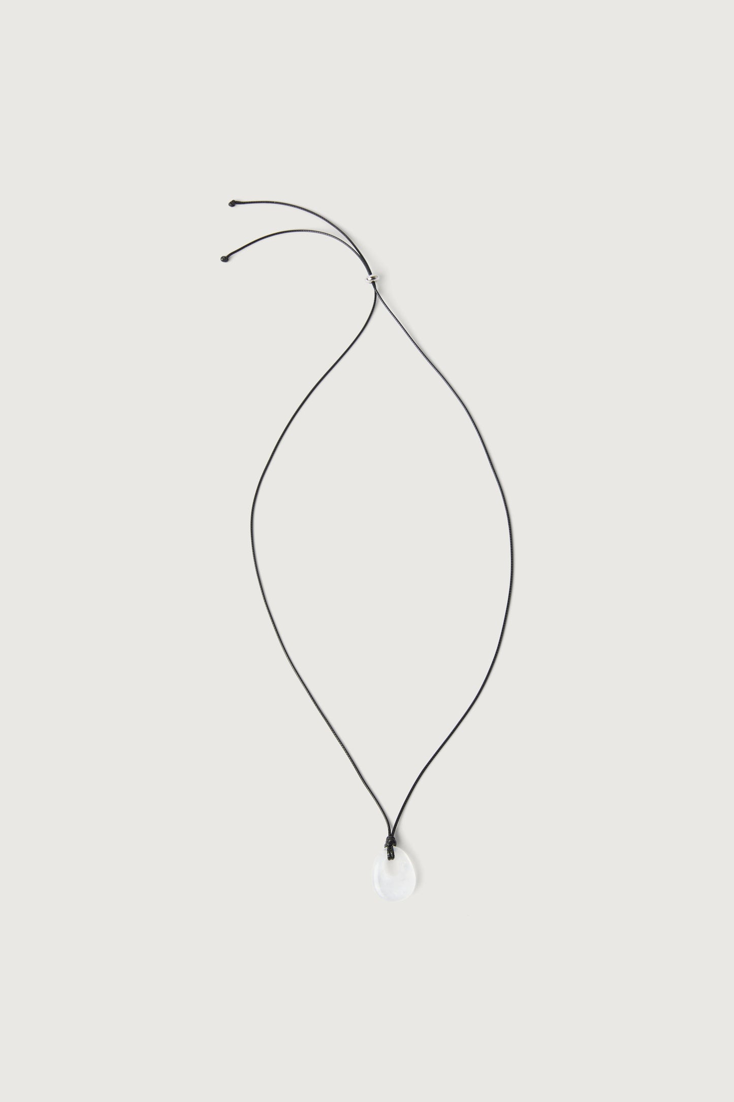 HOLLOW STONE PENDANT NECKLACE