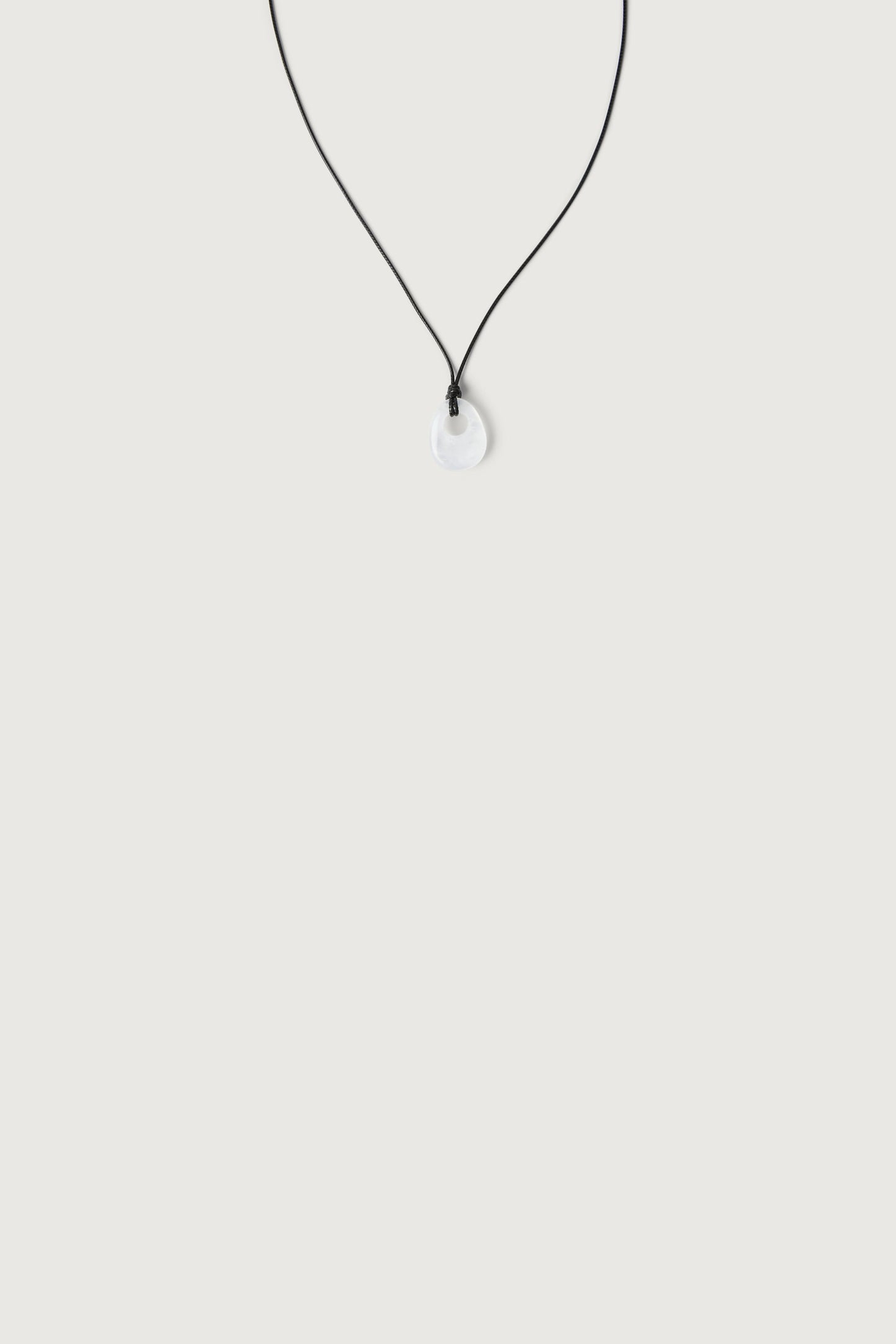 HOLLOW STONE PENDANT NECKLACE
