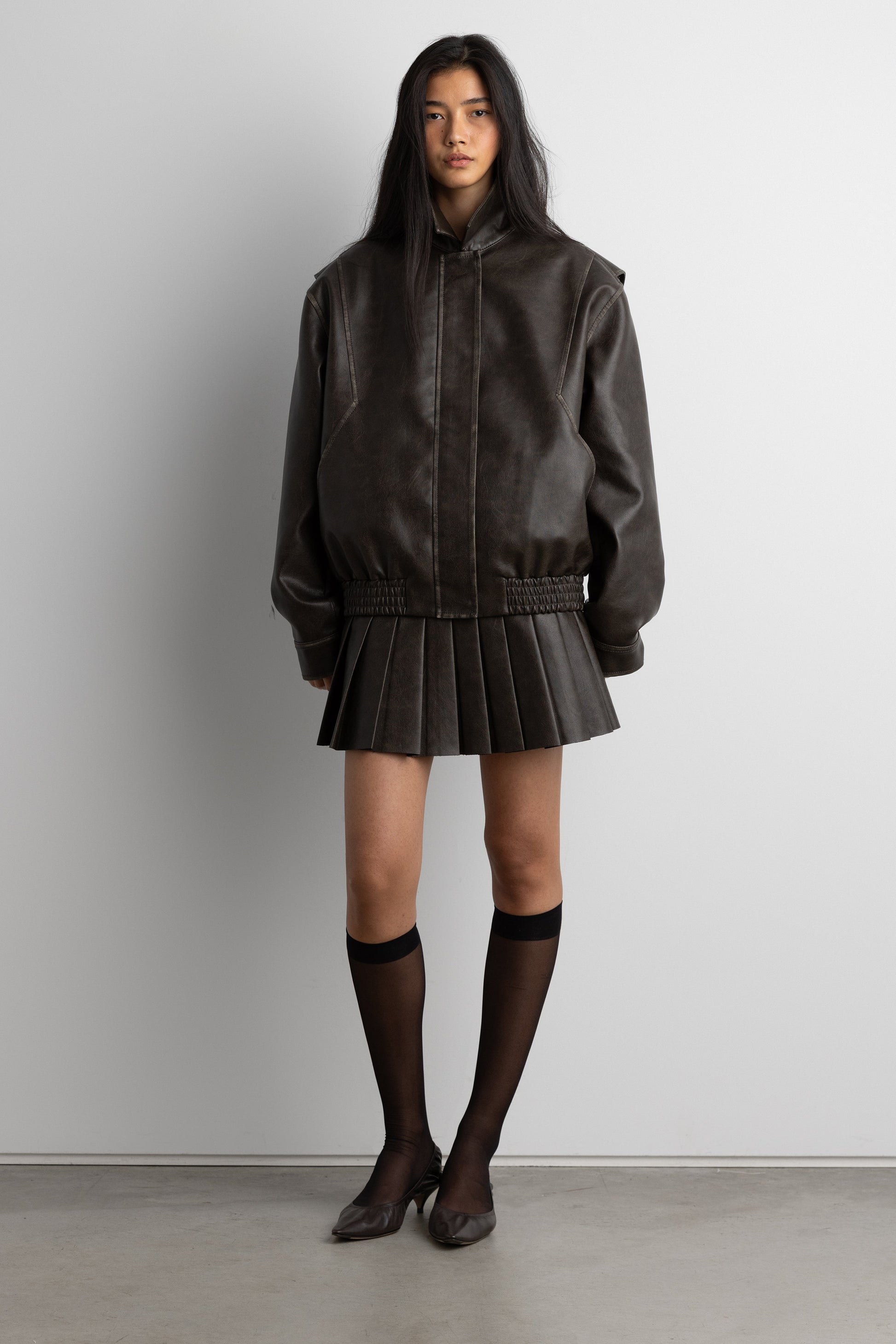VEGAN LEATHER PLEATED MINI SKORT