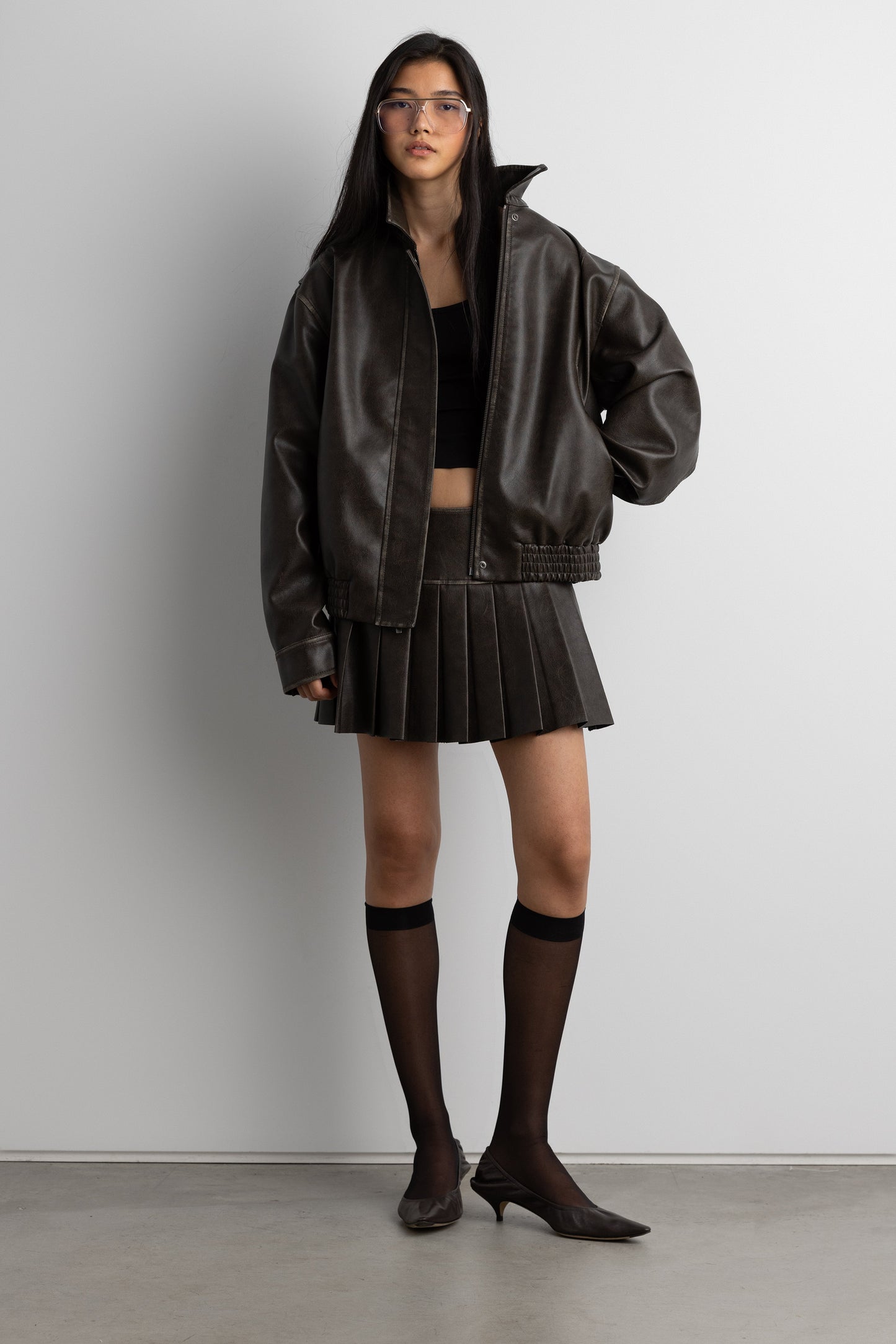 VEGAN LEATHER PLEATED MINI SKORT