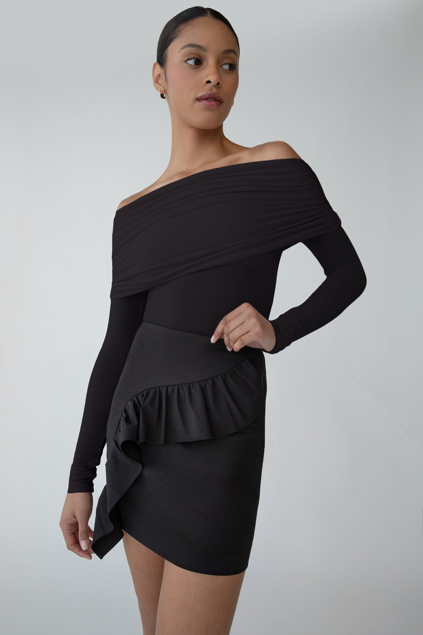 MINI SKIRT WITH CURVED RUFFLE