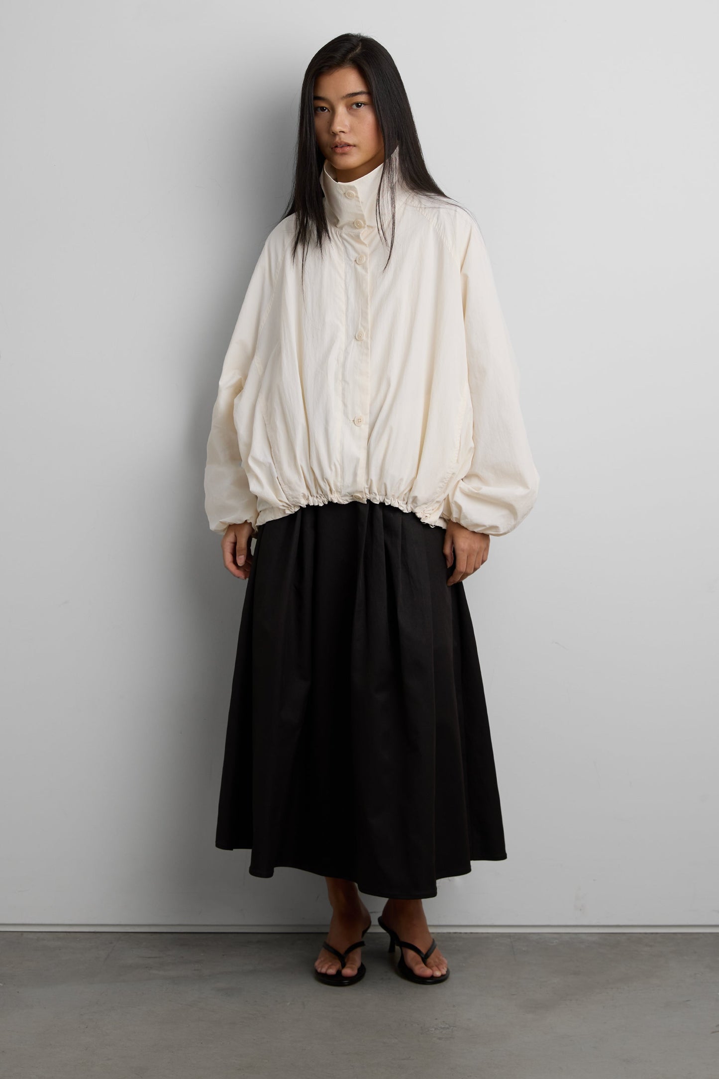 FRONT PLEATED MAXI SKIRT