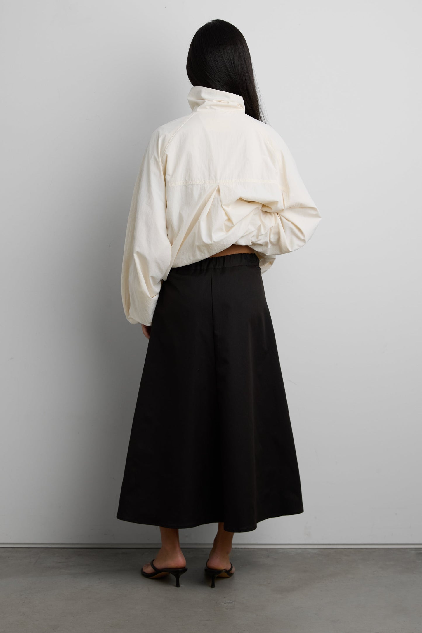 FRONT PLEATED MAXI SKIRT