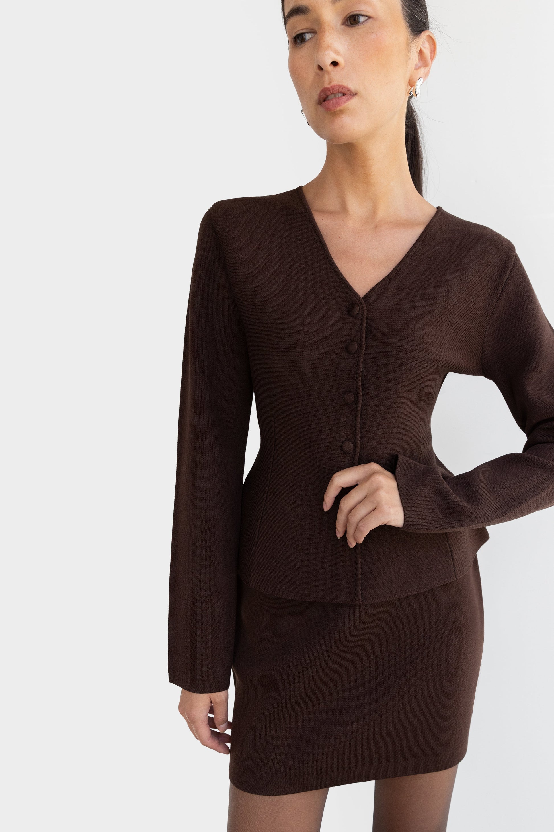 BUTTON FRONT PEPLUM SWEATER